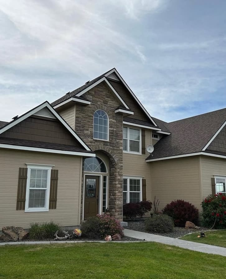 Brown Shingles on Stone Home